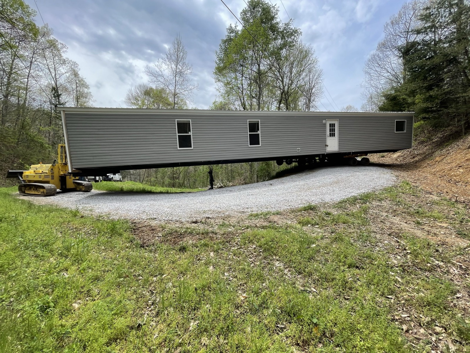 A graded gravel pad ready for a mobile home set