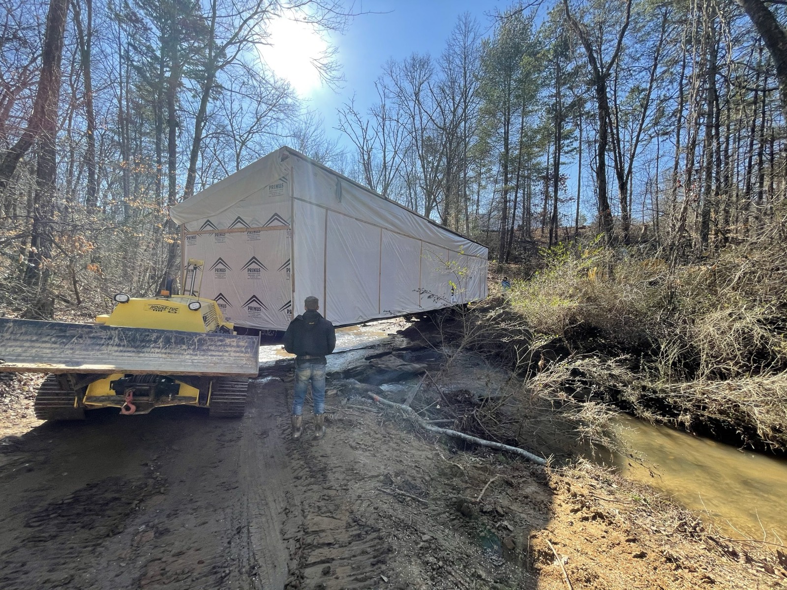 Crossing a creek with a home on the trailer