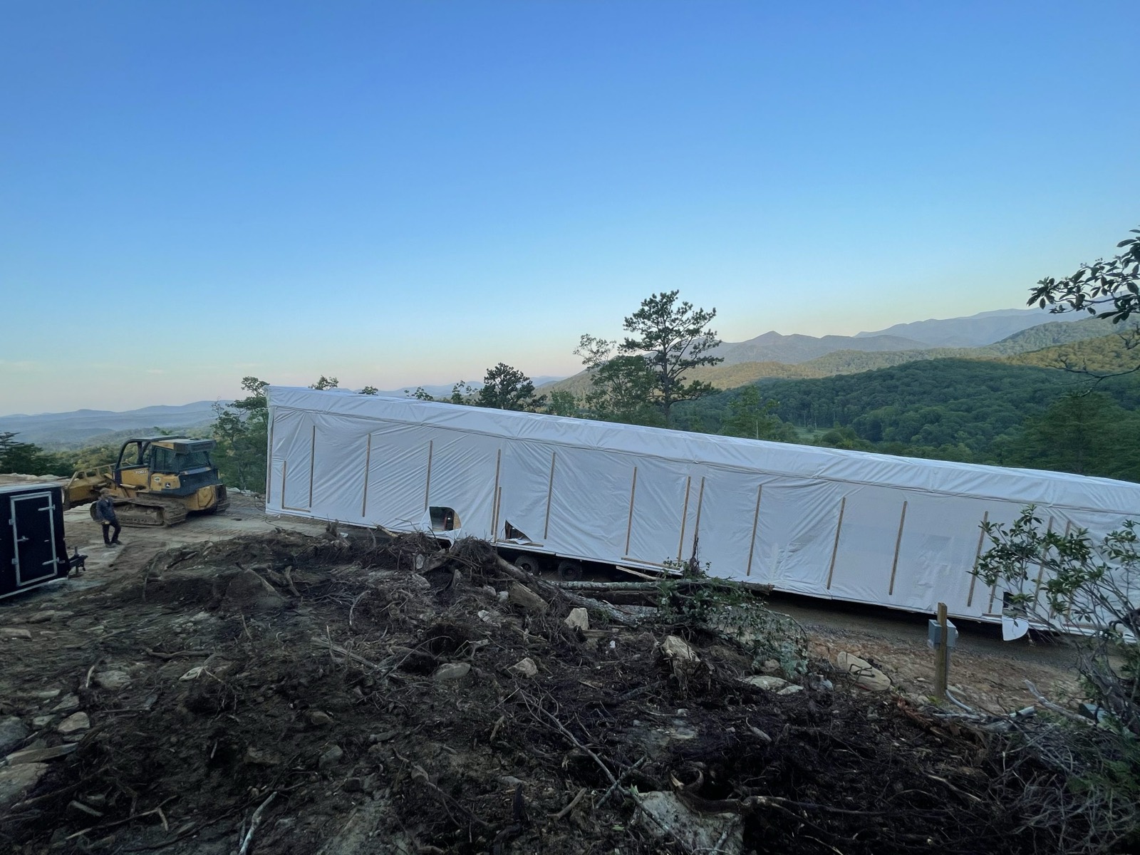 Home on a ridge-top pad with mountain views