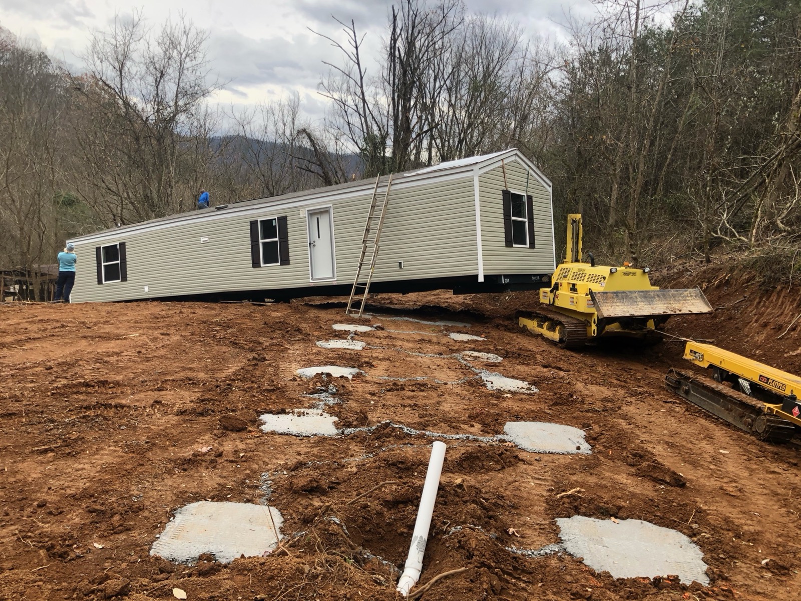 Concrete footers laid out under a home